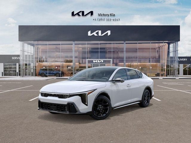 2026 Kia K4 GT-Line Turbo in Snow White Pearl — front three-quarter view