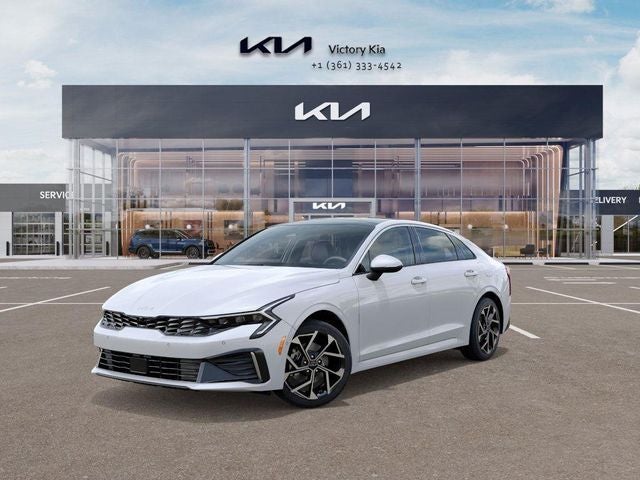 2026 Kia K5 EX in Snow White Pearl — front three-quarter view