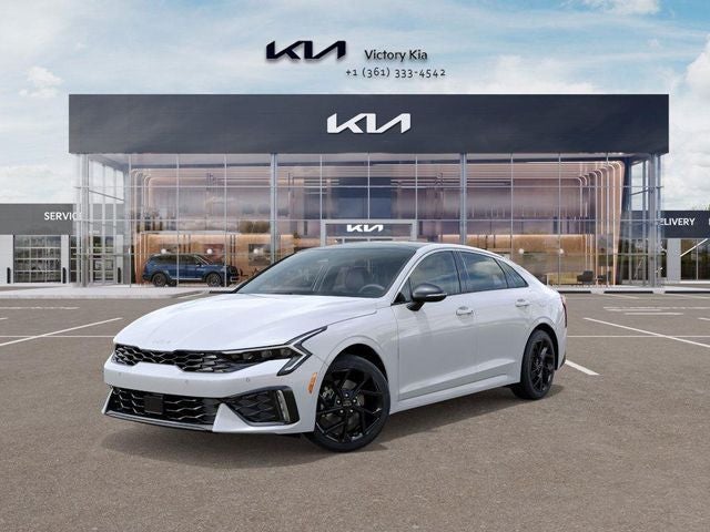2026 Kia K5 GT-Line in Snow White Pearl — front three-quarter view